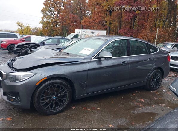 WBA8Z9C5XJB220186 2018 BMW 7 SERIES Gray 