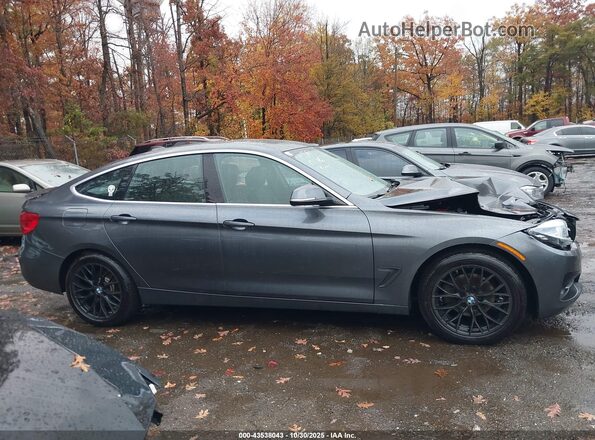 WBA8Z9C5XJB220186 2018 BMW 7 SERIES Gray 