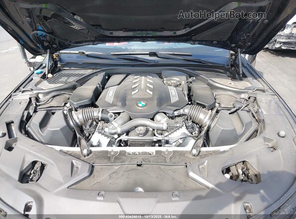 WBAFY4C03MCF29680 2021 BMW M8 Navy Հետևի տեսք