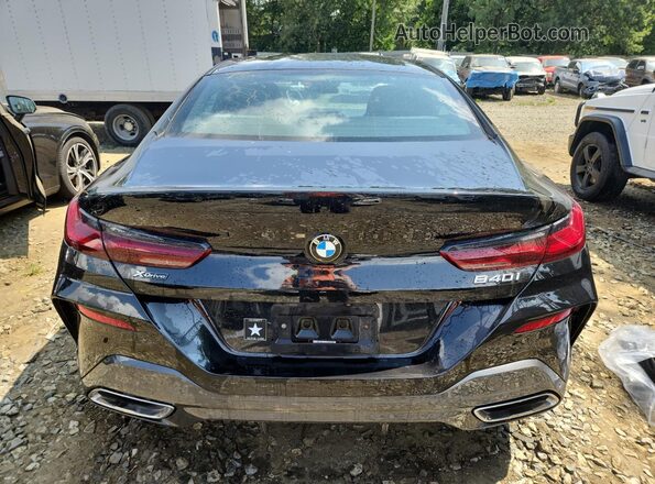 WBAGV4C04NCJ21085 2022 BMW 8 SERIES Black Widok z tyłu