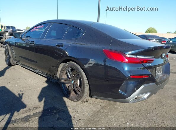 WBAGV4C09PCL67178 2023 BMW 8 SERIES Blue Trasero izquierdo