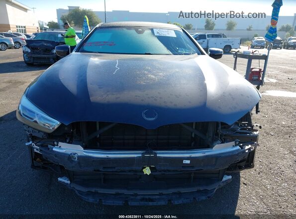 WBAGV4C09PCL67178 2023 BMW 8 SERIES Blue Vista interior trasera