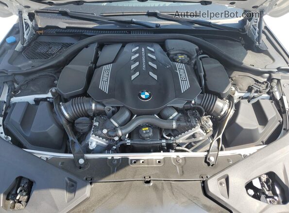 WBAGV8C01PCL69188 2023 BMW M8 White Սալոնի հետևի տեսք