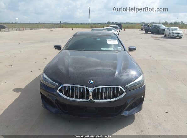WBAGV8C03LCD94123 2020 BMW M8 Black ხელსაწყოთა პანელის ხედი