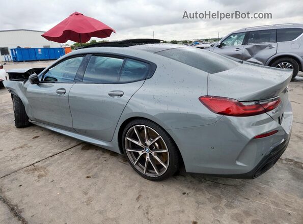 WBAGV8C06NCH21679 2022 BMW M8 Gray Trasero izquierdo