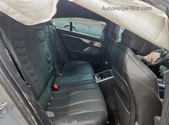 WBAGV8C06NCH21679 2022 BMW M8 Gray Vista de los asientos traseros