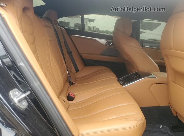 WBAGV8C06PCL31066 2023 BMW M8 Black Widok tylnych siedzeń