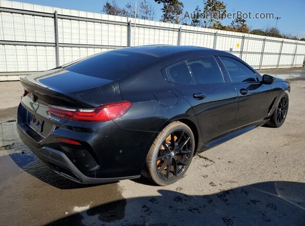 WBAGV8C09NCH96974 2022 BMW M8 Black Rear right