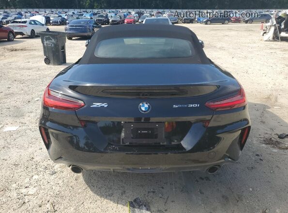 WBAHF3C02SWY44651 2025 BMW Z4 Black Հետևի տեսք