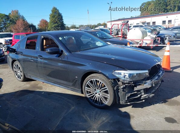 WBAJA9C05LCD31807 2020 BMW 5 SERIES Dark Blue Vista interior trasera