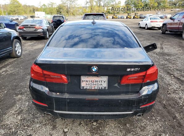 WBAJR3C09LCD75394 2020 BMW 5 SERIES Black Widok z tyłu