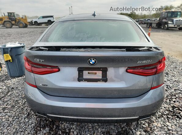 WBAJV6C54JBJ99752 2018 BMW 6 SERIES Gray Rear view