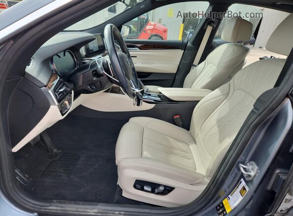 WBAJV6C54JBJ99752 2018 BMW 6 SERIES Gray Front interior view