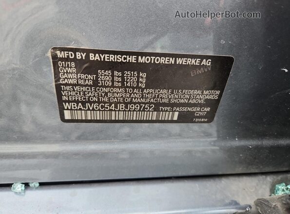 WBAJV6C54JBJ99752 2018 BMW 6 SERIES Gray Engine compartment view