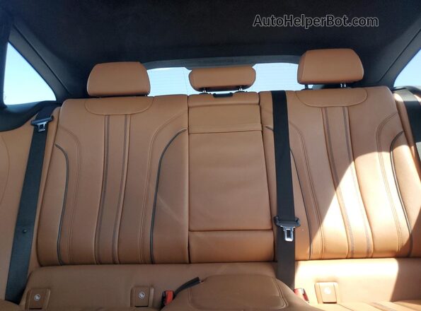 WBAJV6C54JBJ99802 2018 BMW 6 SERIES Burgundy Rear seats view