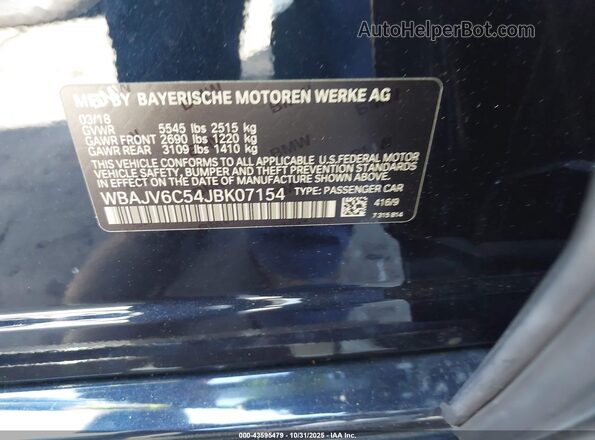WBAJV6C54JBK07154 2018 BMW 6 SERIES Navy Vista del compartimento del motor