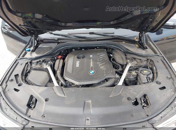 WBAJV6C59JBK07389 2018 BMW 6 SERIES Dark Blue Rear view