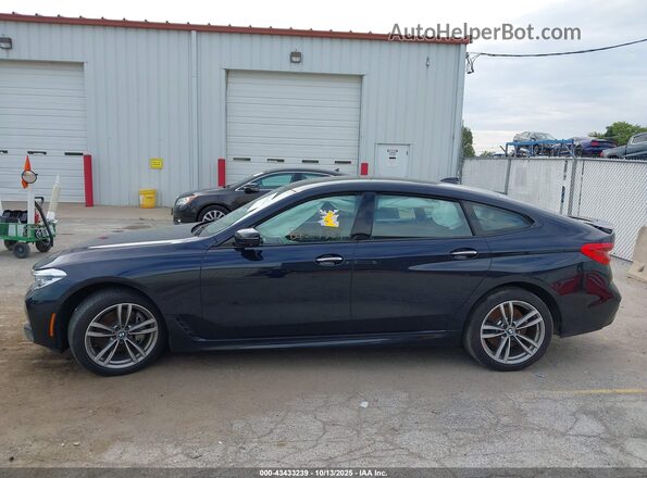 WBAJV6C59JBK07389 2018 BMW 6 SERIES Dark Blue Rear interior view