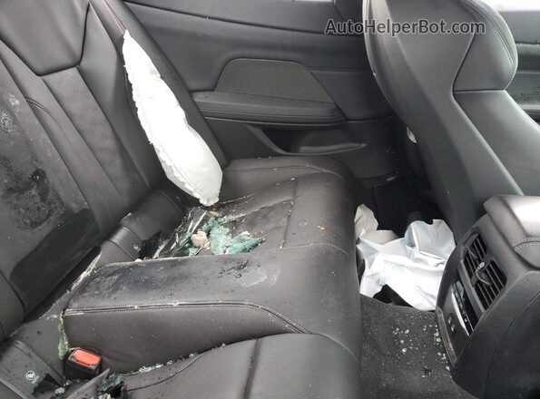WBS33AZ04PCL70799 2023 BMW M4 White Vista de los asientos traseros