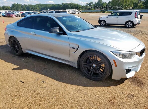 WBS3R9C56GK335950 2016 BMW M4 Серебряный Передняя правая четверть