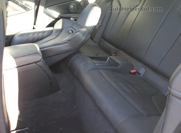 WBS4Y9C59JAC87772 2018 BMW M4 Blue Rear seats view