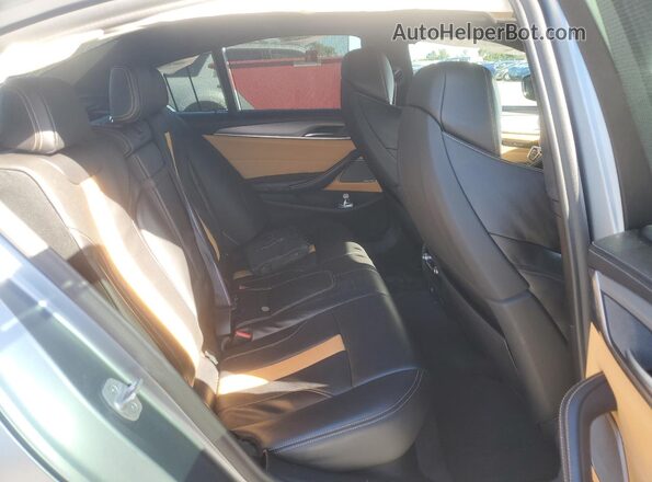 WBS83CH07MCG71682 2021 BMW M5 Gray Widok tylnych siedzeń
