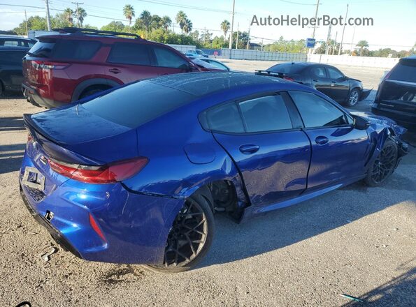 WBSGV0C07NCH48337 2022 BMW M8 Blue Rear right