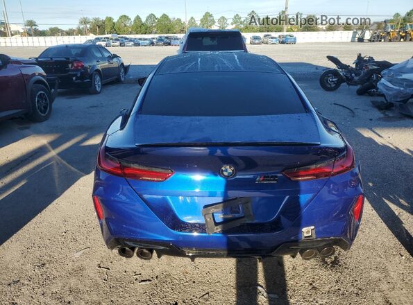 WBSGV0C07NCH48337 2022 BMW M8 Blue Rear view