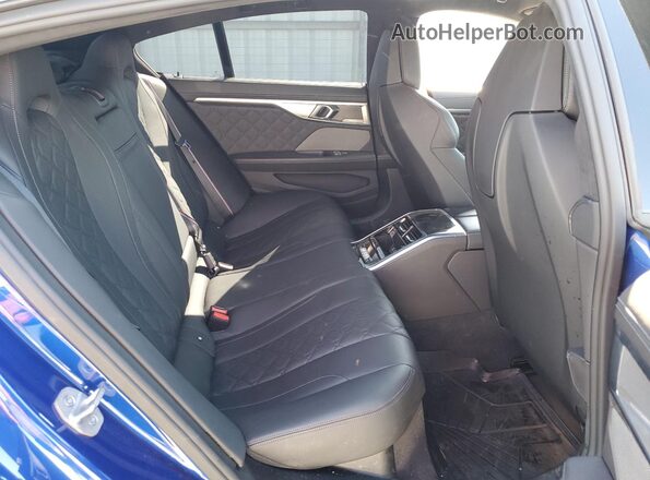 WBSGV0C08PCM43252 2023 BMW M8 Blue უკანა სავარძლების ხედი