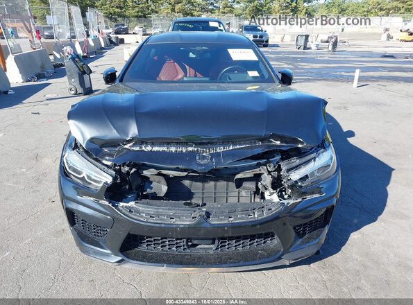 WBSGV0C09MCF13517 2021 BMW M8 Black Front view