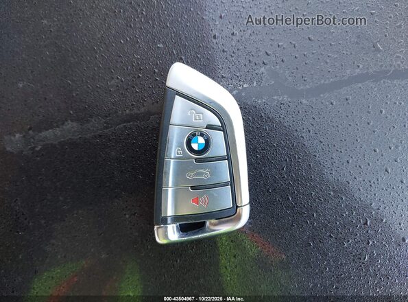 WBSJF0C09LB448883 2020 BMW M5 Black Առջևի վահանակի տեսք
