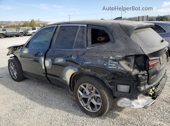 WBX47DP02RN271221 2024 BMW X3 Black Trasero izquierdo