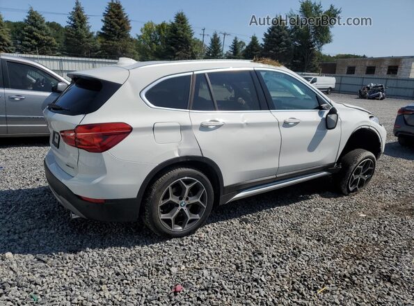 WBXHT3C32J5L30957 2018 BMW X1 White 