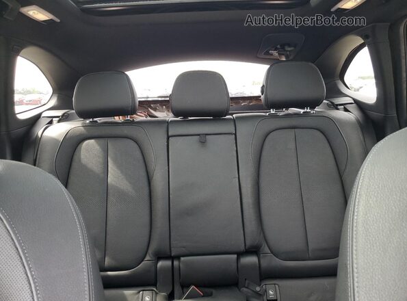 WBXHT3C33GP885221 2016 BMW X1 Brown Vista de los asientos traseros