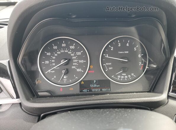 WBXHT3C33GP885221 2016 BMW X1 Brown Vista del cuadro de instrumentos