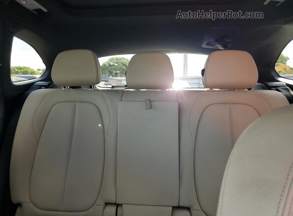 WBXHT3C36H5F82630 2017 BMW X1 Blue Հետևի նստատեղերի տեսք