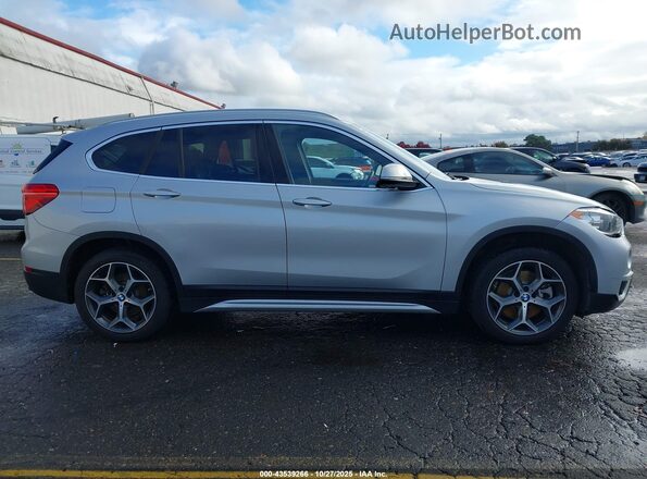 WBXHT3C58K5L38659 2019 BMW X1 Gray Вид задньої частини салону