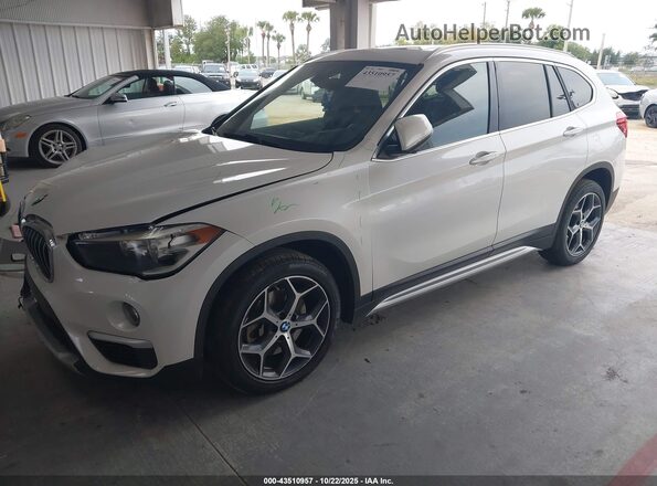 WBXHT3C58K5L89689 2019 BMW X1 White წინა მარცხენა ხედი სამი მეოთხედიდან
