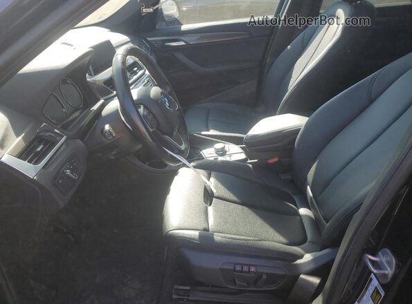 WBXHT3C58K5N75412 2019 BMW X1 Black Widok wnętrza z przodu