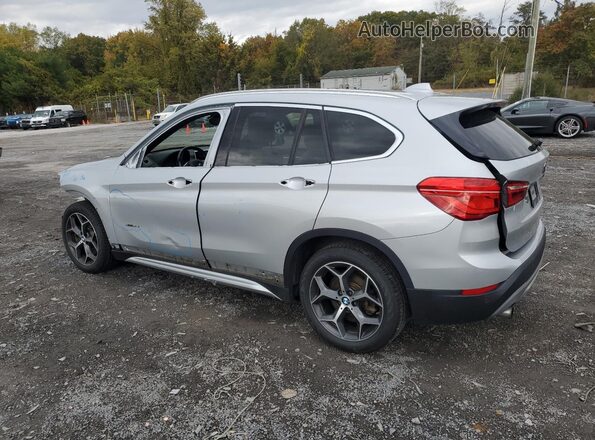 WBXHT3Z36G4A48720 2016 BMW X1 Silver Tył lewy