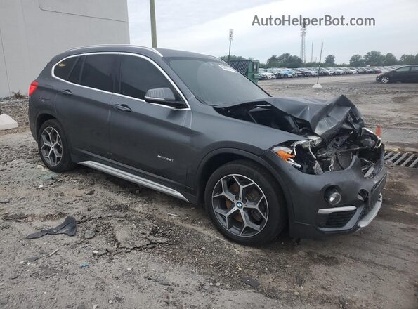 WBXHU7C33HP924704 2017 BMW X1 Gray Przód prawy