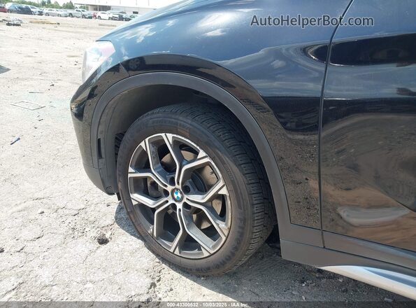 WBXJG7C01L5R71958 2020 BMW X1 Black Widok z przodu