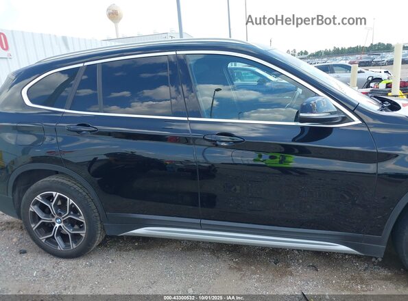 WBXJG7C01L5R71958 2020 BMW X1 Black Widok wnętrza z tyłu
