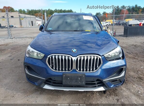 WBXJG9C00M5T62583 2021 BMW X1 Blue ხელსაწყოთა პანელის ხედი