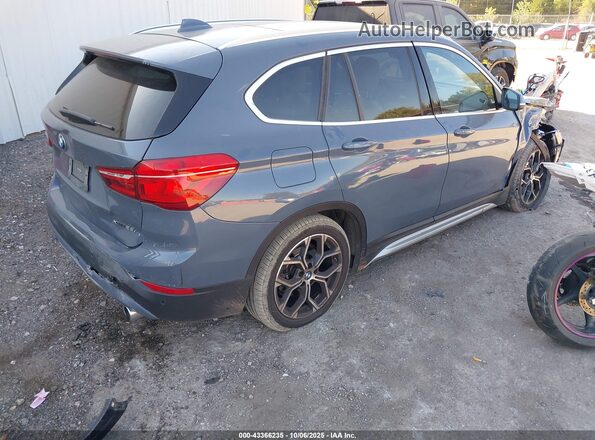 WBXJG9C04M3M68370 2021 BMW X1 Light Blue Rear right