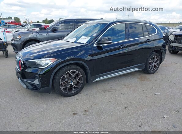 WBXJG9C08L5P96149 2020 BMW X1 Black Przód lewy
