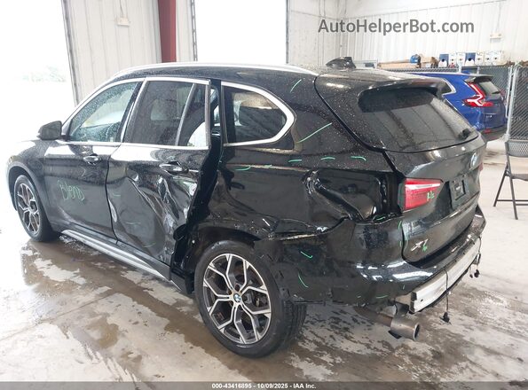 WBXJG9C09L3L83796 2020 BMW X1 Black Դիմացի տեսք
