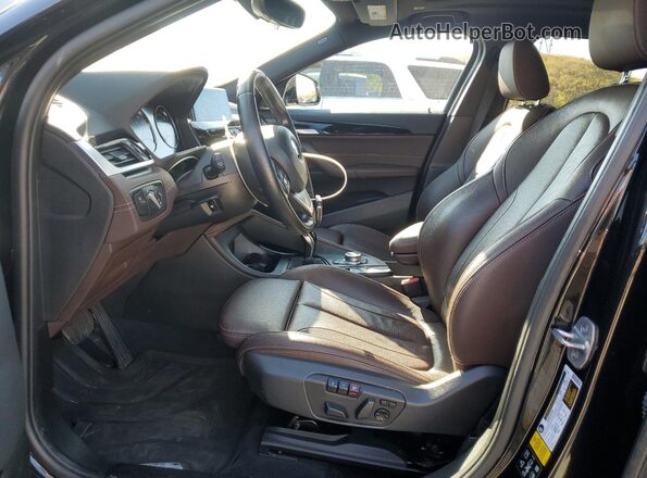 WBXYJ1C01M5S26237 2021 BMW X2 Black Front interior view