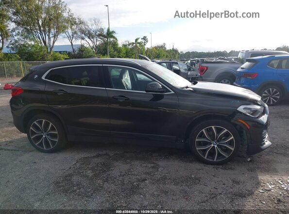 WBXYJ1C03L5P80426 2020 BMW X2 Black Սալոնի հետևի տեսք