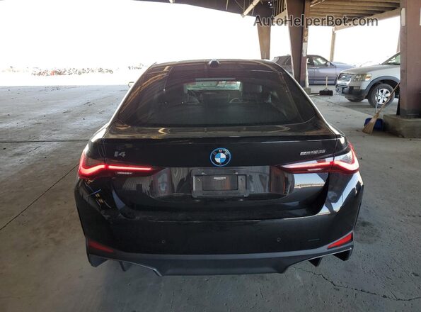 WBY43AW04PFP97753 2023 BMW I4 Black Вид ззаду